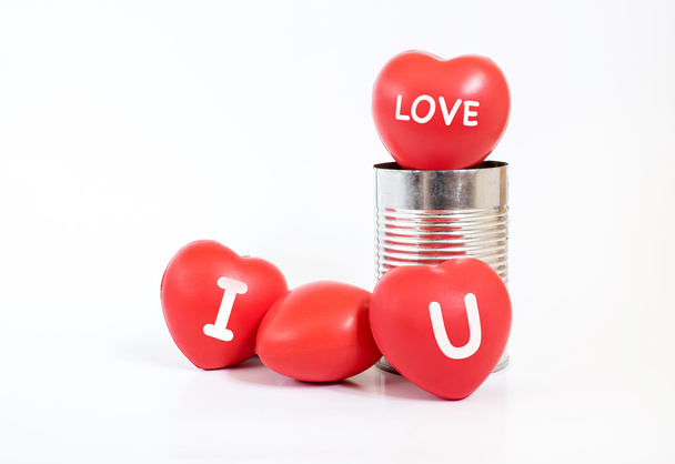 Many Hearts with "I love you and love " word on it in tin can on - Foto, immagini