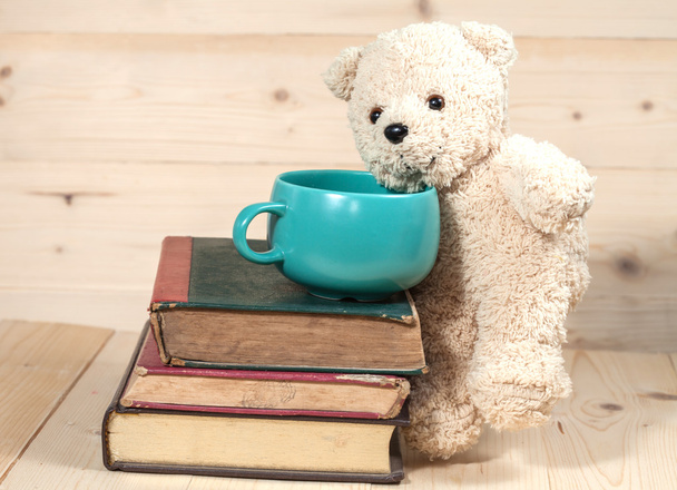 bear toy with cup of coffee - Фото, изображение