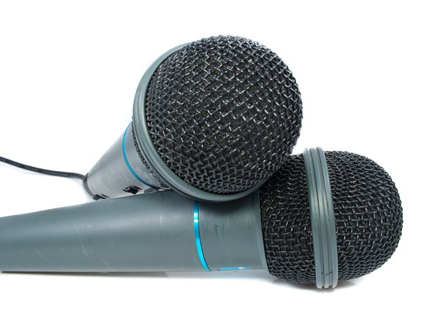 Karaoke microphone. Isolated on white background - 写真・画像