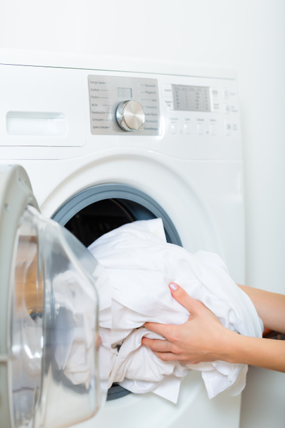 Housekeeper with washing machine - Foto, immagini