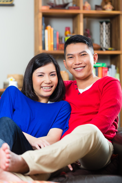 Asian couple on the sofa - Φωτογραφία, εικόνα