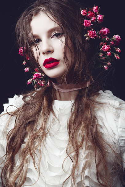 young girl with flowers - Valokuva, kuva