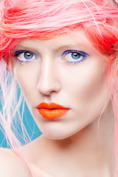 model with bright  makeup and  pink hair - Fotó, kép