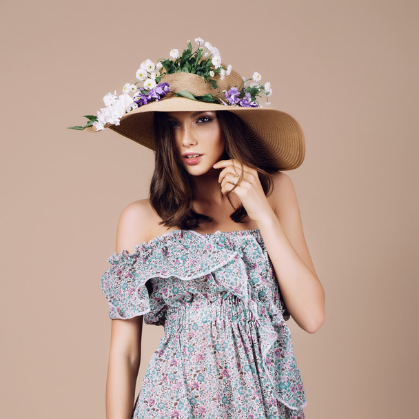beautiful girl in a hat and dress - Фото, изображение