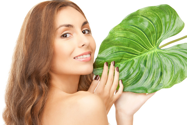 Woman with green leaf - Photo, Image