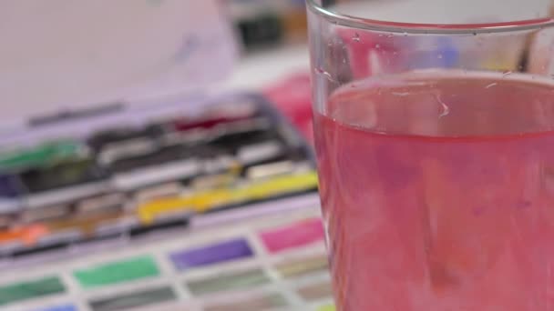 watercolor brush dipped in water - Footage, Video