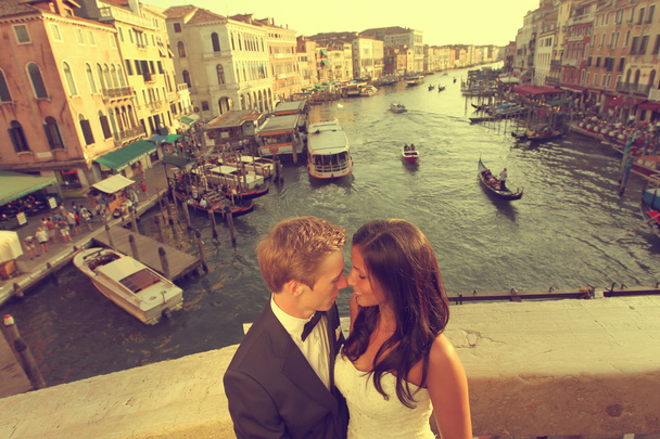 Bride and groom embracing in Venice, Italy - Photo, image