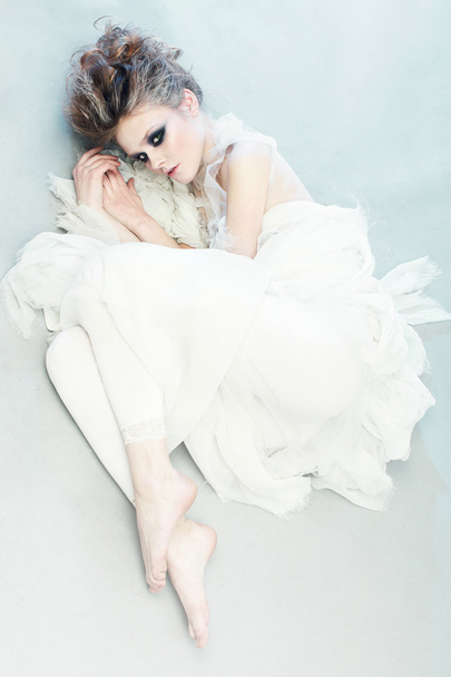 woman with make up in white long dress - 写真・画像