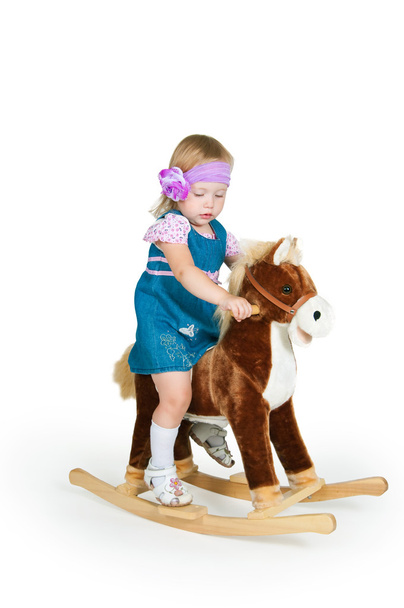 Babyand toys horse isolated on white - Foto, Bild