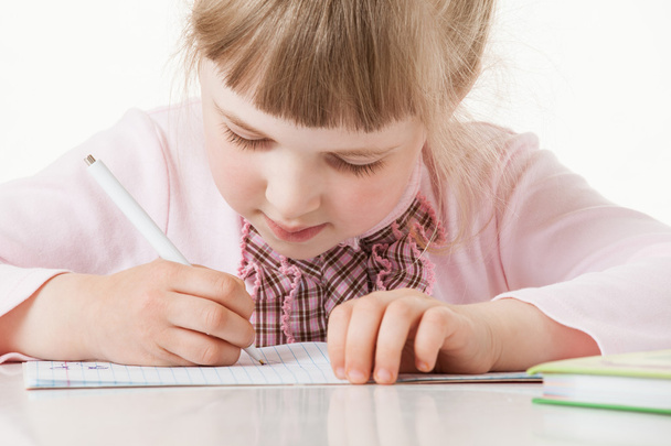 School girl learning to write - Foto, immagini