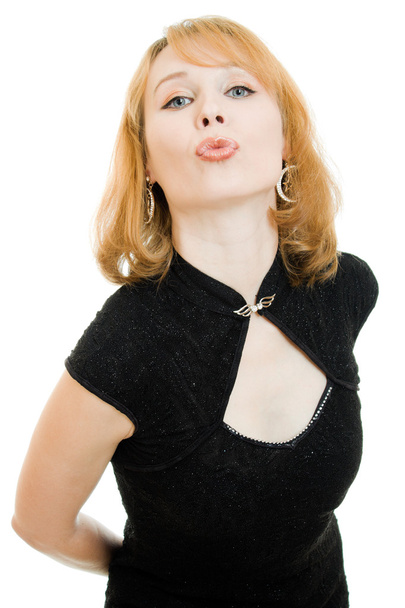 Beautiful young woman puckering up for a kiss - Photo, image