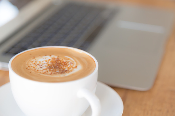 Laptop with coffee cup - Foto, imagen