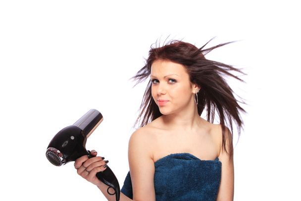 Woman with fashion hairstyle holding hairdryer - Valokuva, kuva