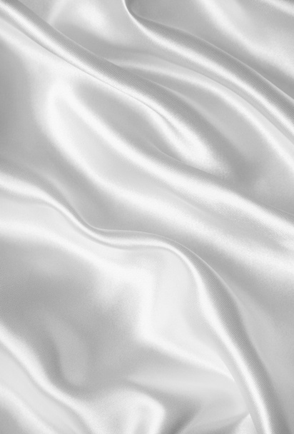 Smooth elegant white silk or satin as wedding background - Foto, Imagen