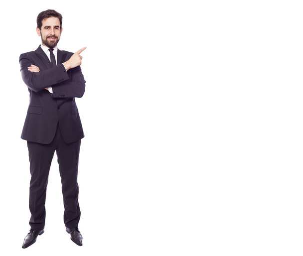 Businessman pointing to copy space - Foto, Imagen