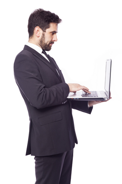Business man with a laptop - Photo, image