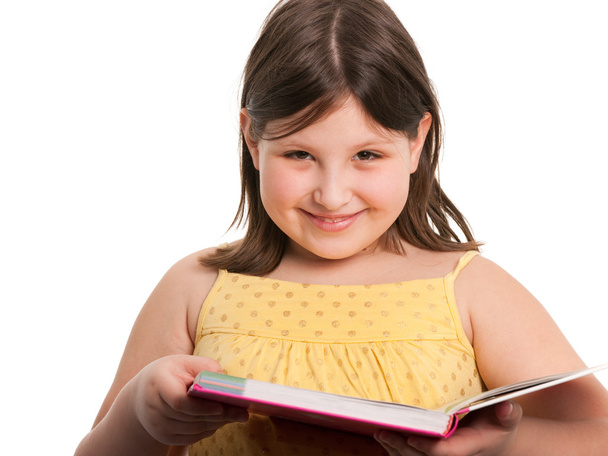 Cheerful reading girl - Valokuva, kuva
