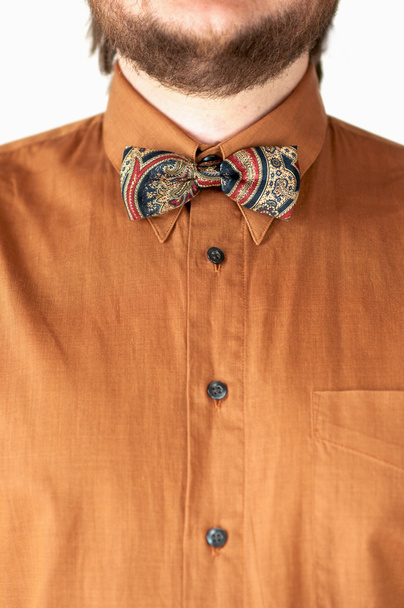 Colorful bow tie with brown shirt - Valokuva, kuva