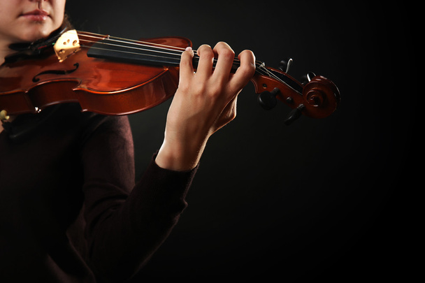 Violinist playing violin - Foto, Imagen