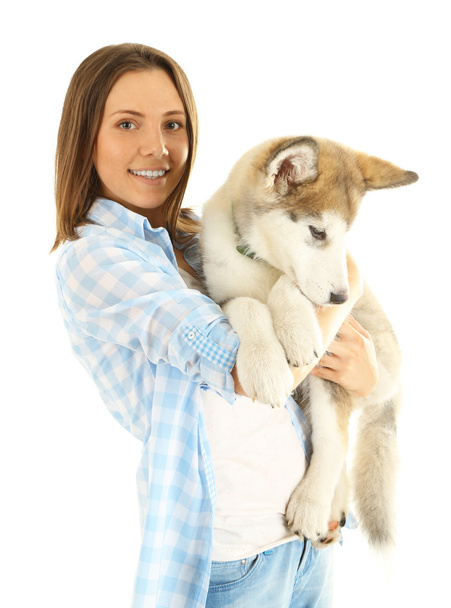 Young woman with malamute puppy - Фото, изображение