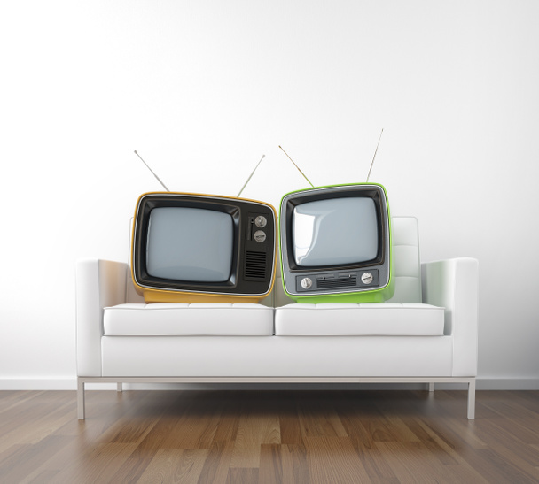 Two retro tv on couch - Photo, Image