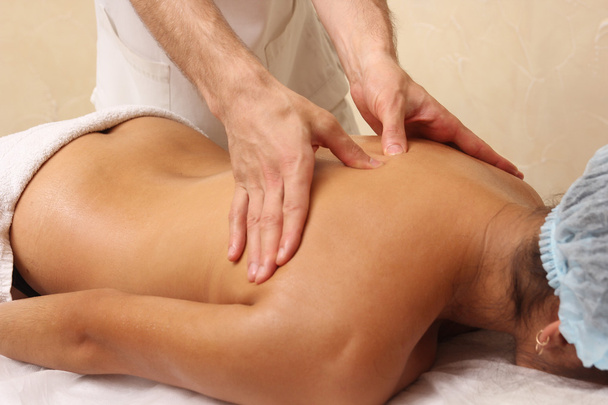 Back massage in the spa salon. - Foto, imagen