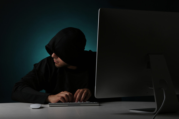 anonymous Hacker with computer  - Foto, Imagem