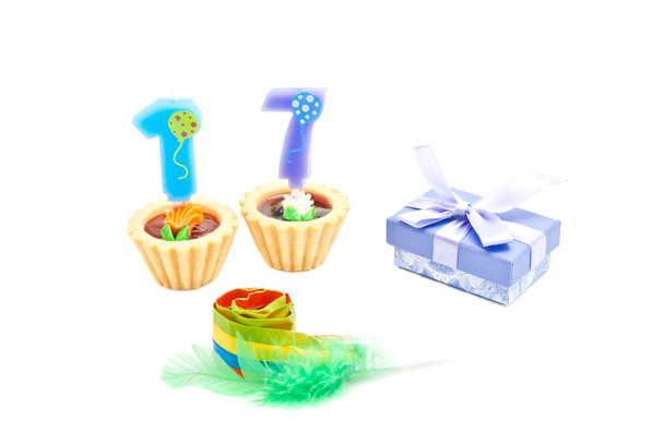 cakes with seventeen years birthday candles, whistle and gift  - Фото, зображення