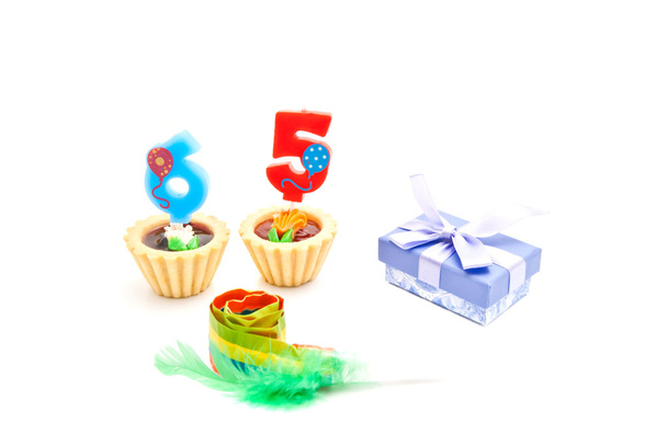 cakes with sixty five years birthday candles, whistle and gift - Фото, зображення