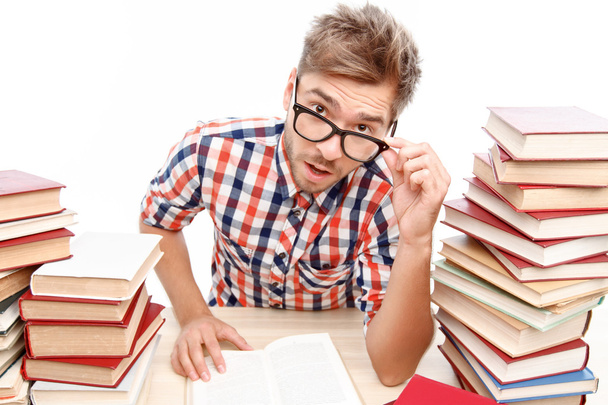 Positive student studying in the library  - Foto, Bild