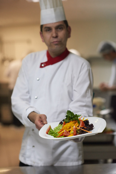 chef in hotel kitchen view - Foto, imagen