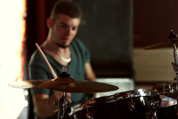 Drummer playing drums  - Фото, зображення