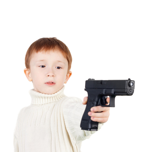 little boy with black pistol - Foto, imagen
