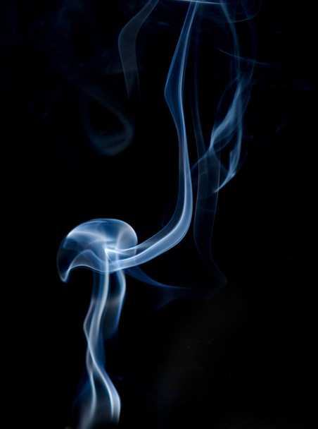 Smoke on a black or dark background closeup - Foto, Imagen