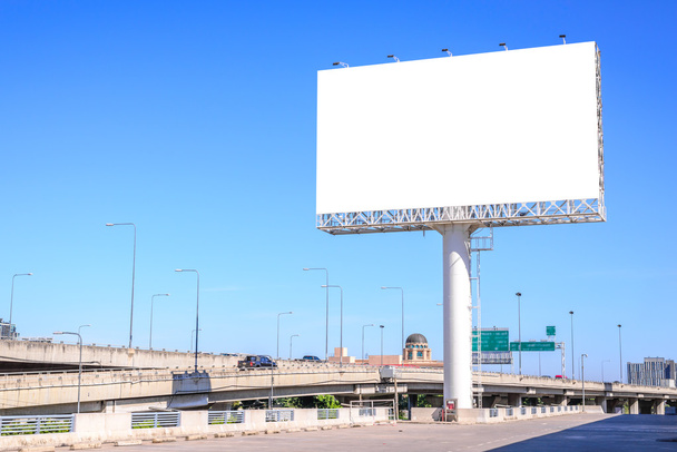 Blank billboard against blue sky for advertisement. - Photo, Image