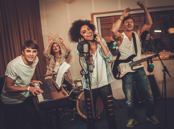 Multiracial music band in a recording studio - Photo, Image