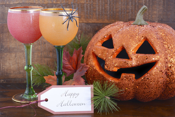 Happy Halloween table with Jack O Lantern pumpkin - 写真・画像