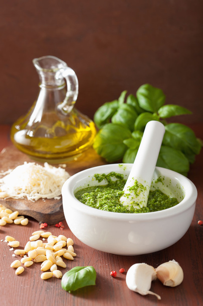 ingredients and pesto sauce over wooden rustic background - Photo, Image