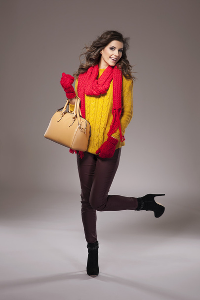 Girl wearing a warm autumnal outfit - Photo, Image