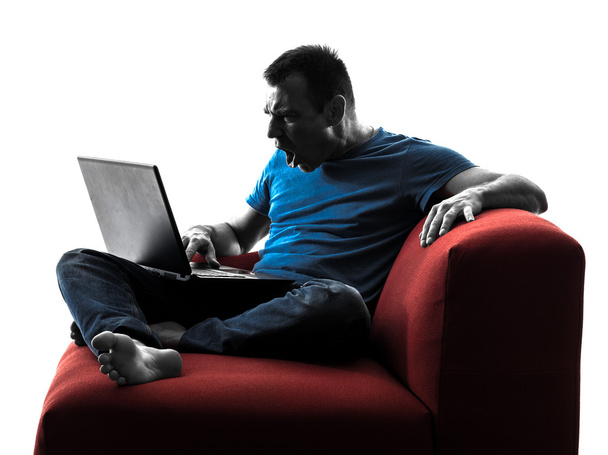άνθρωπος καναπέ καναπέ υπολογιστή υπολογιστών lap-top - Φωτογραφία, εικόνα
