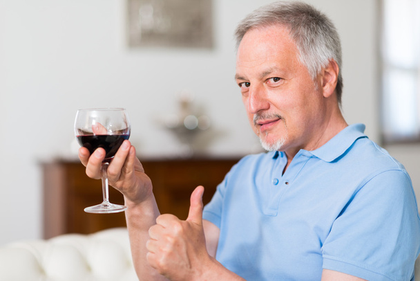 man drinking glass of wine - Photo, Image