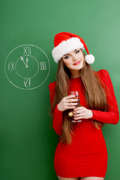 Santa pretty girl with glass of champagne - Foto, immagini