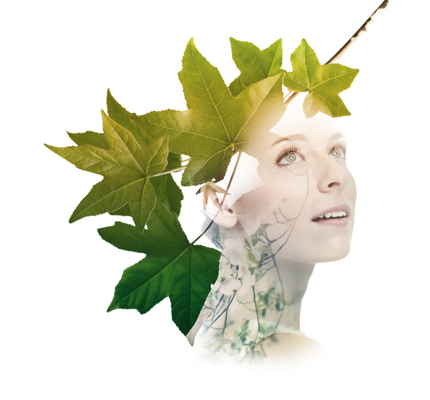 Double exposure of woman with tree leaves - Фото, изображение