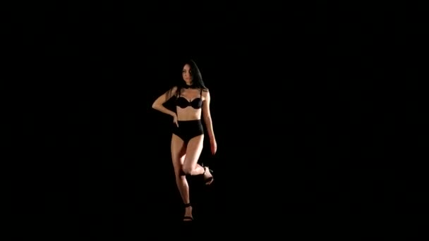 Young go-go dancer in the black - Imágenes, Vídeo