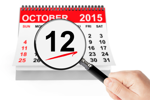 Dag van Columbus Concept. 12 oktober 2015 kalender met Vergrootglas  - Foto, afbeelding