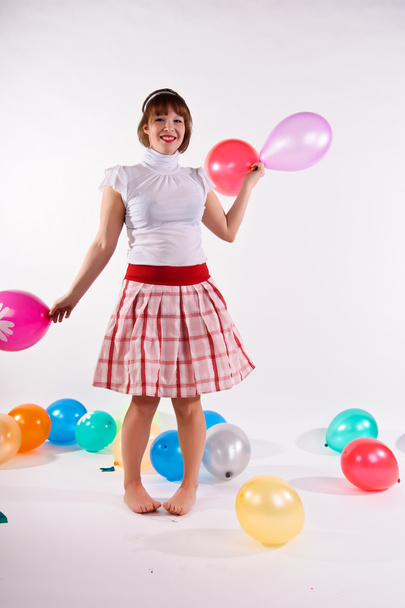 Cute young girl with balloons - Фото, изображение