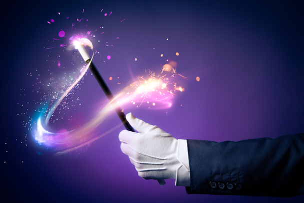 Kouzelník ruka s kouzelnou hůlkou - Fotografie, Obrázek