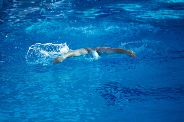 swimmer in indoor swimming pool - 写真・画像