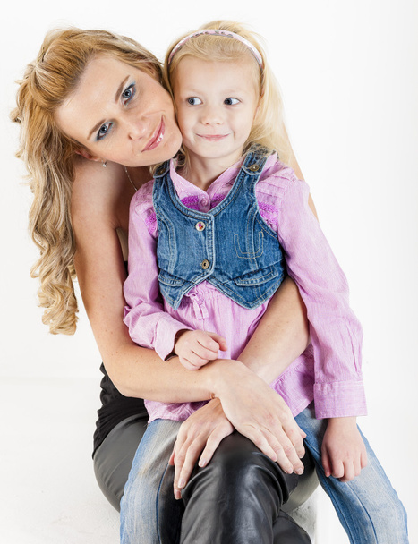 portrait of little girl with her mother - Fotó, kép