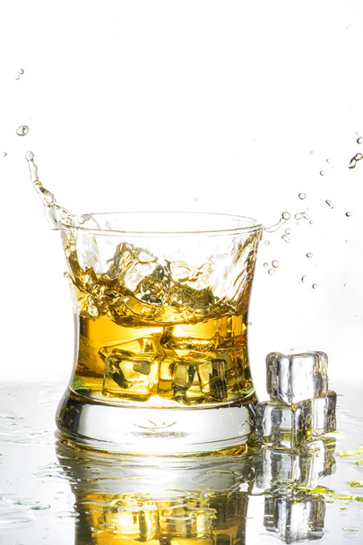 Whisky splash isolated on a white background - Foto, imagen